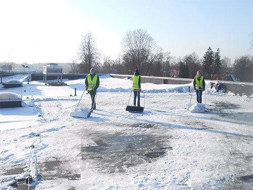 Snow shoveling from the flat roofs