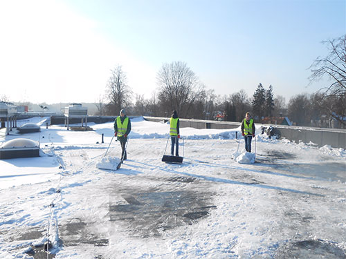 Snow shoveling from the flat roofs